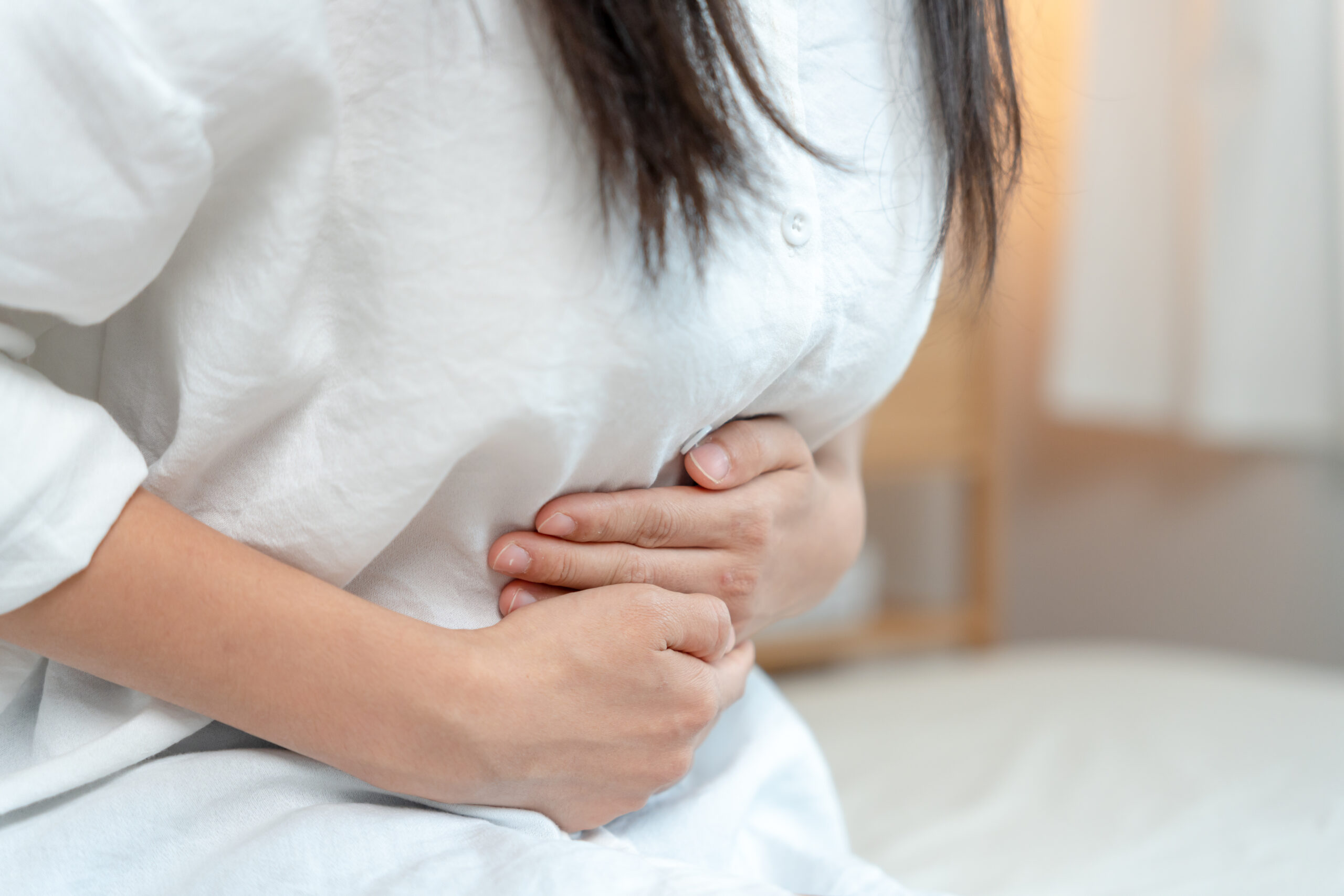 Atrofi Vagina, Kondisi Gangguan Vagina yang Perlu Kamu Waspadai 2 vecteezy stomach ache asian women have abdominal pain indigestion 18974051 scaled